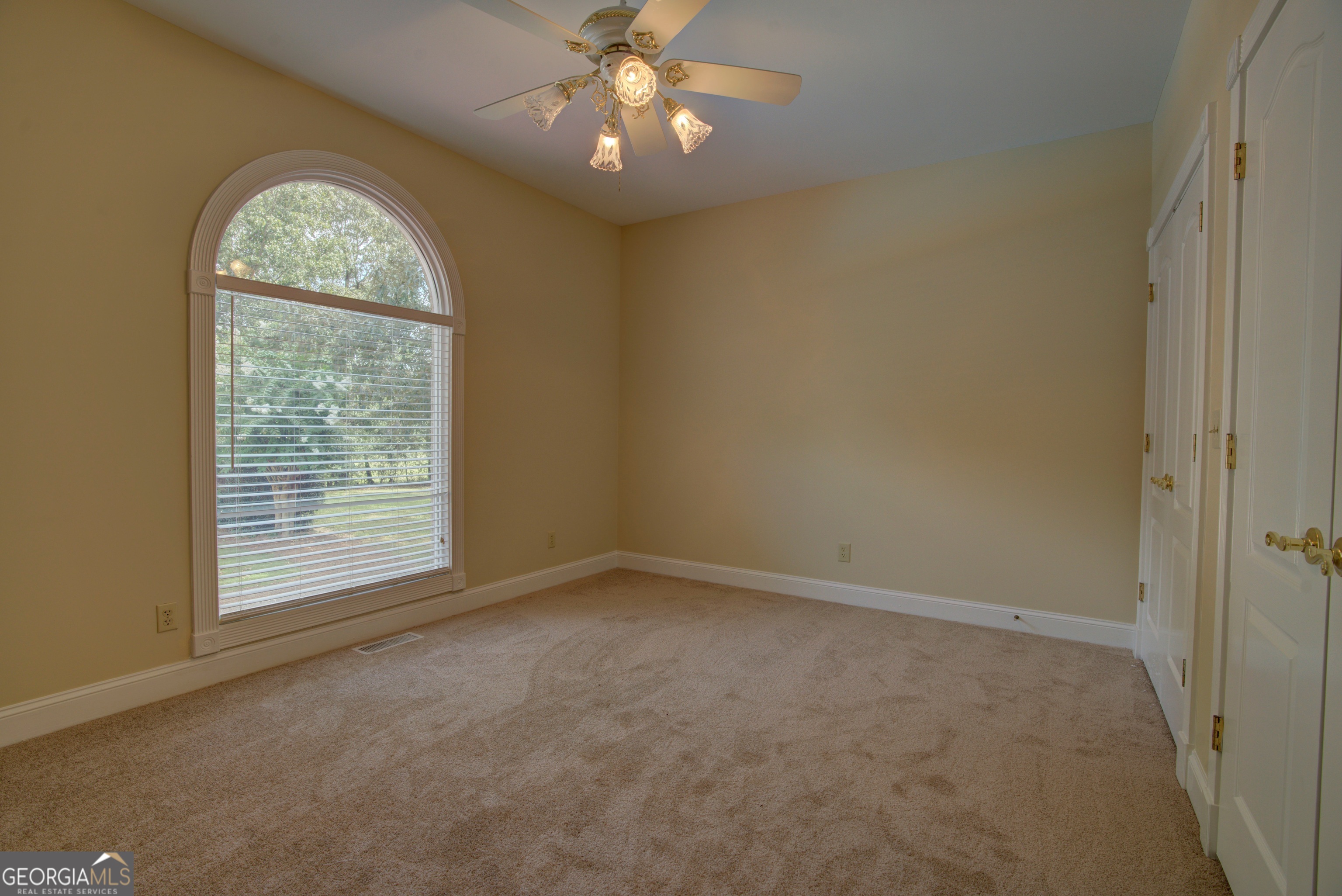 2011 Bailey Road Aragon, GA 30104 - Photo 27 of 66 an empty room with a window and a chandelier