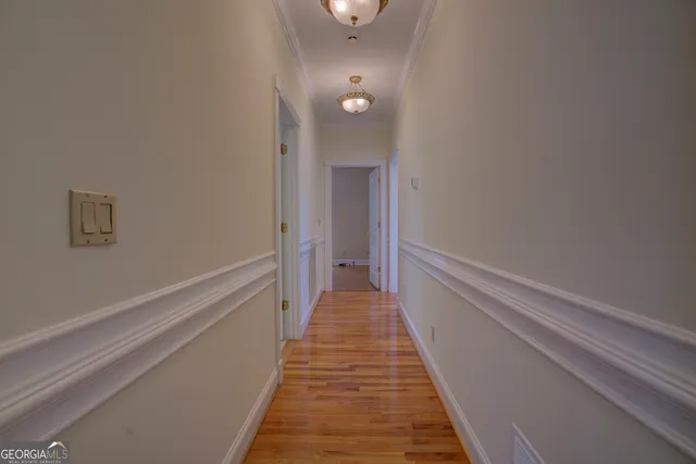 a view of a backyard with swimming pool