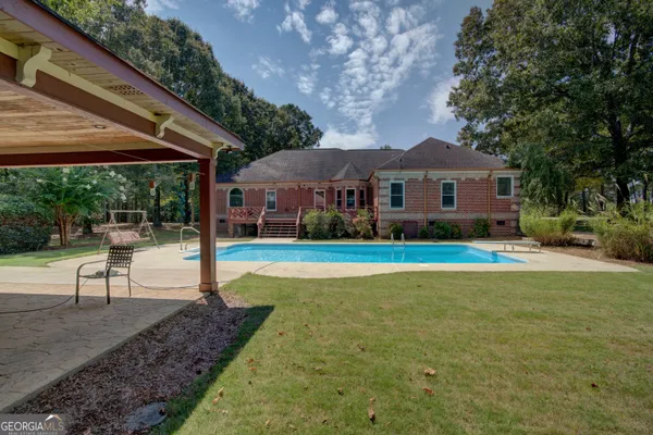 a front view of a house with yard