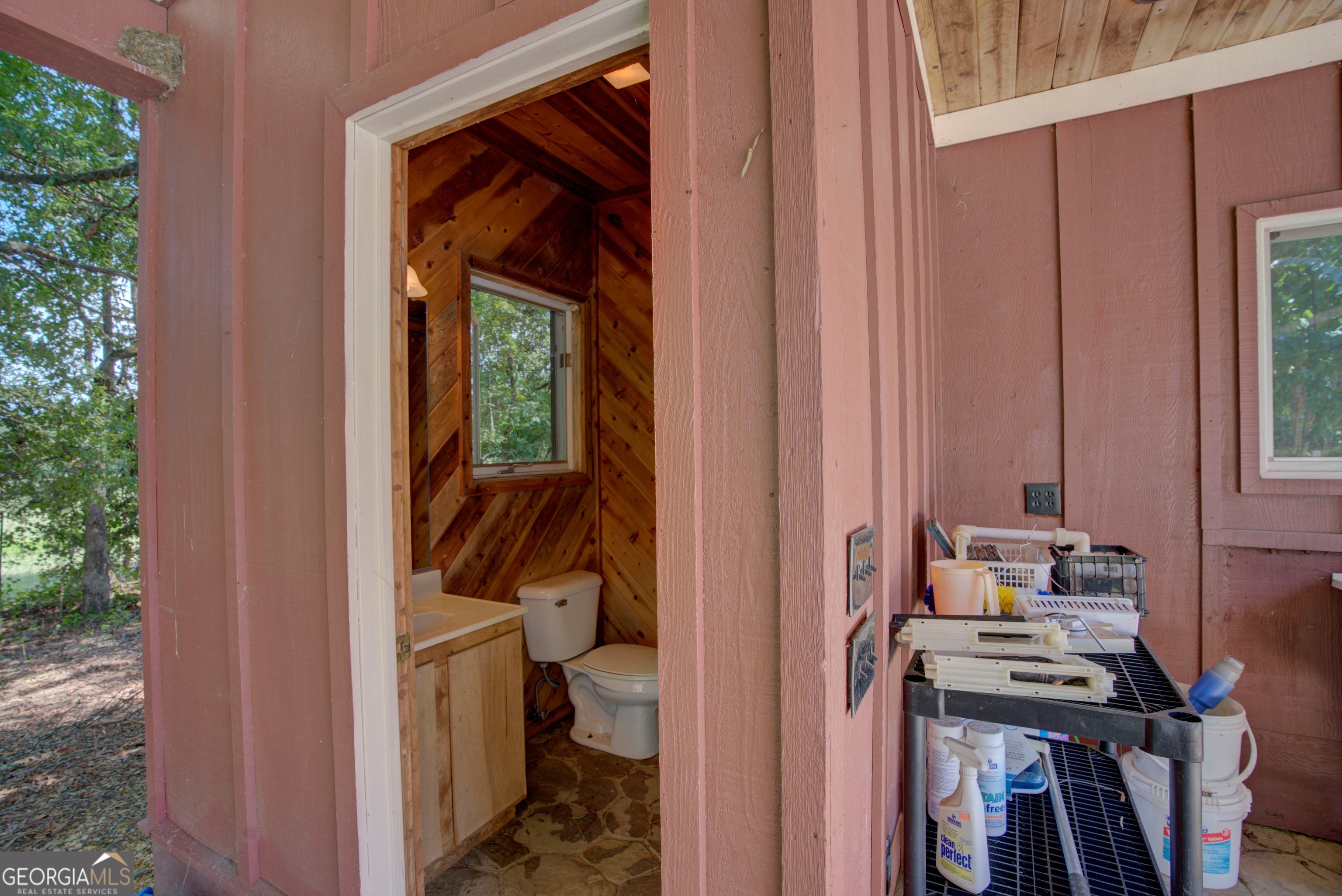2011 Bailey Road Aragon, GA 30104 - Photo 34 of 66 a view of a hallway with a door and wooden floor