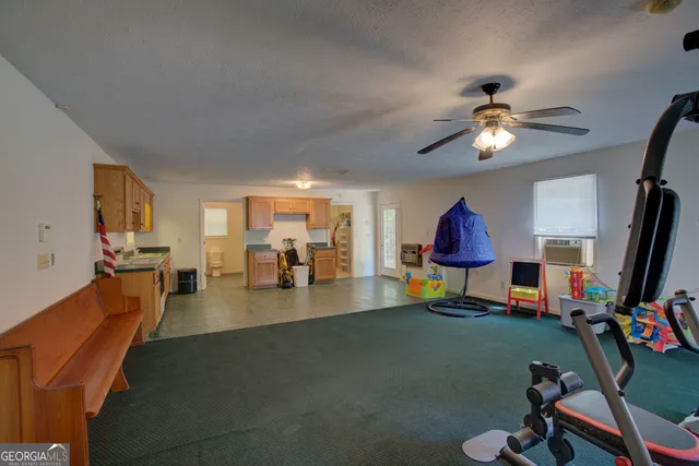 a view of a livingroom with furniture and wooden floor