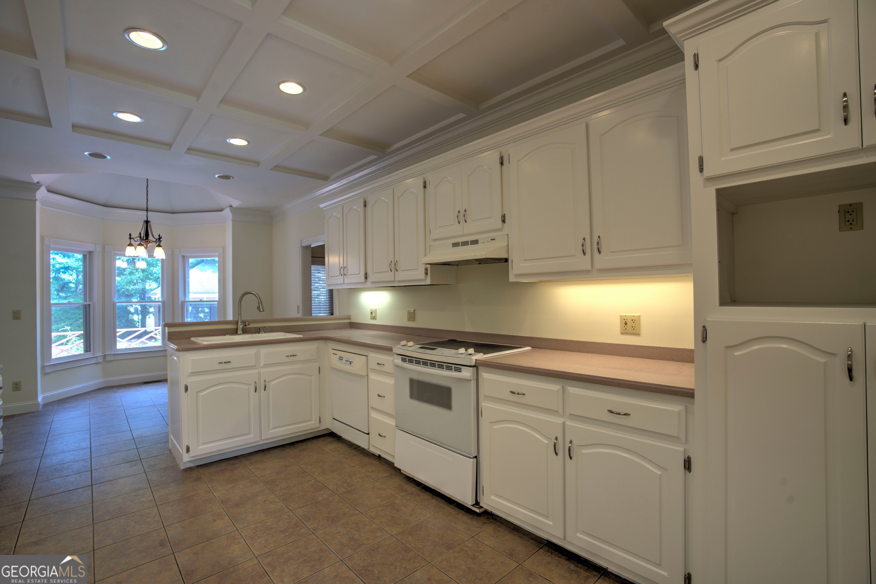 2011 Bailey Road Aragon, GA 30104 - Photo 63 of 66 a kitchen with granite countertop white cabinets and white appliances