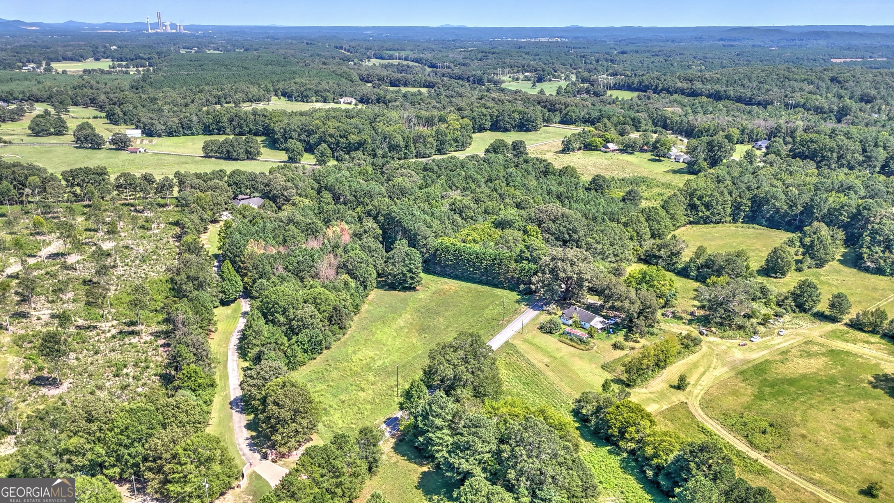 2011 Bailey Road Aragon, GA 30104 - Photo 8 of 66 a view of a lush green field with lots of trees in it
