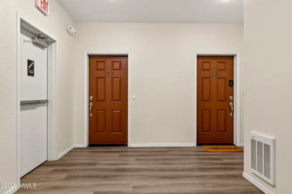 a view of a chairs with table and chairs