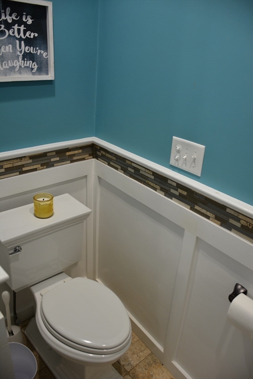 54 Dwight Street, Unit 3 Brookline, MA 02446 - Photo 7 of 16 a bathroom with a toilet and a sink