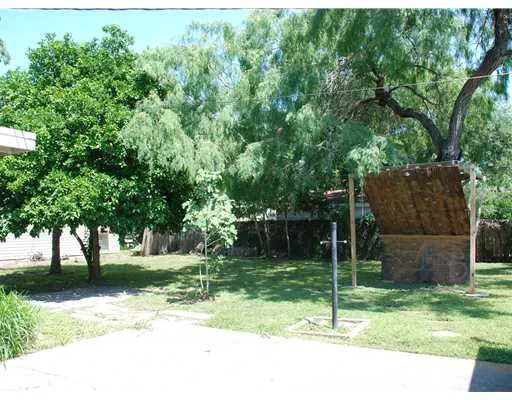 a backyard of a house with entertaining space