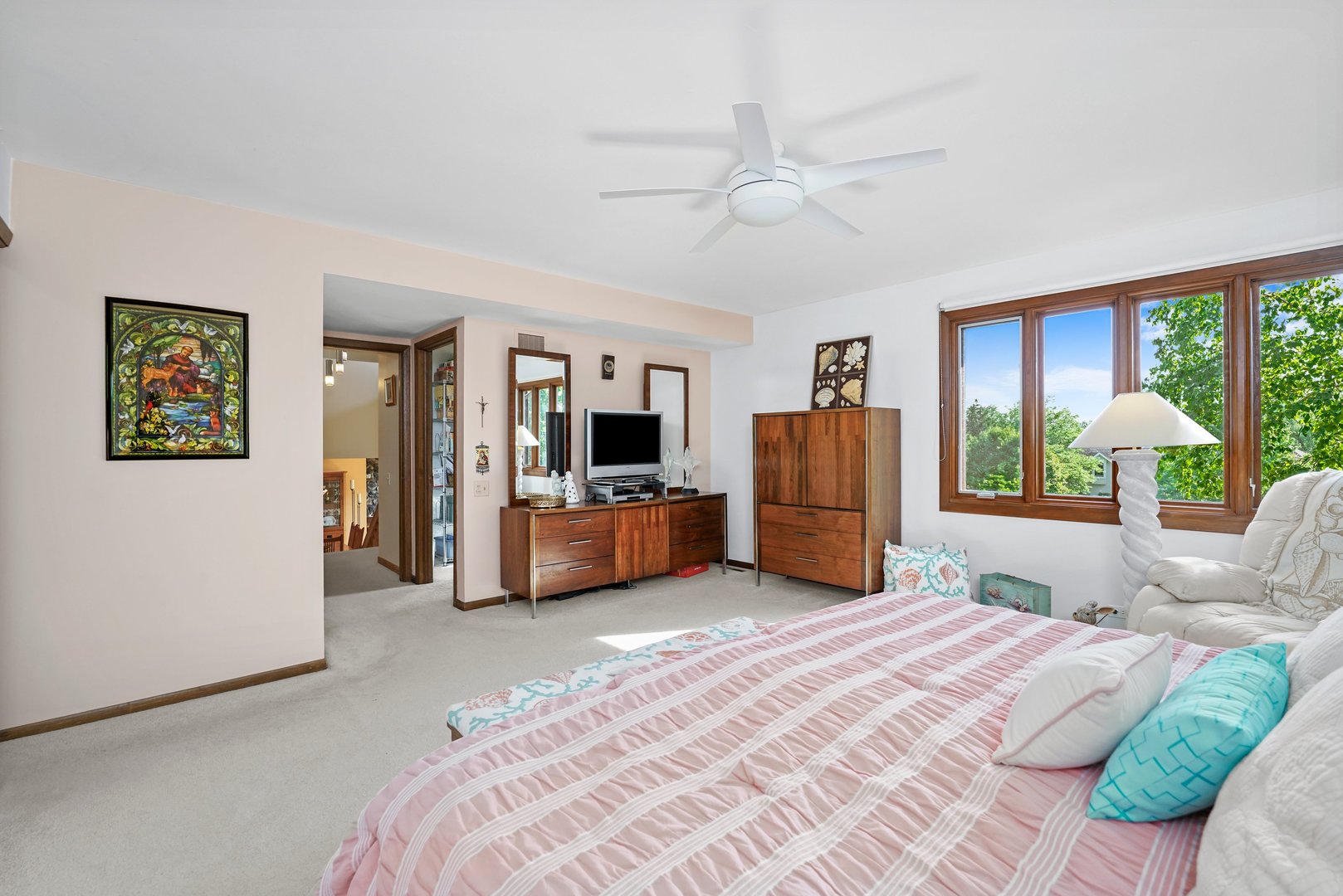 20320 Lea Road Deer Park, IL 60010 - Photo 12 of 31 a spacious bedroom with a bed a dresser and a large window