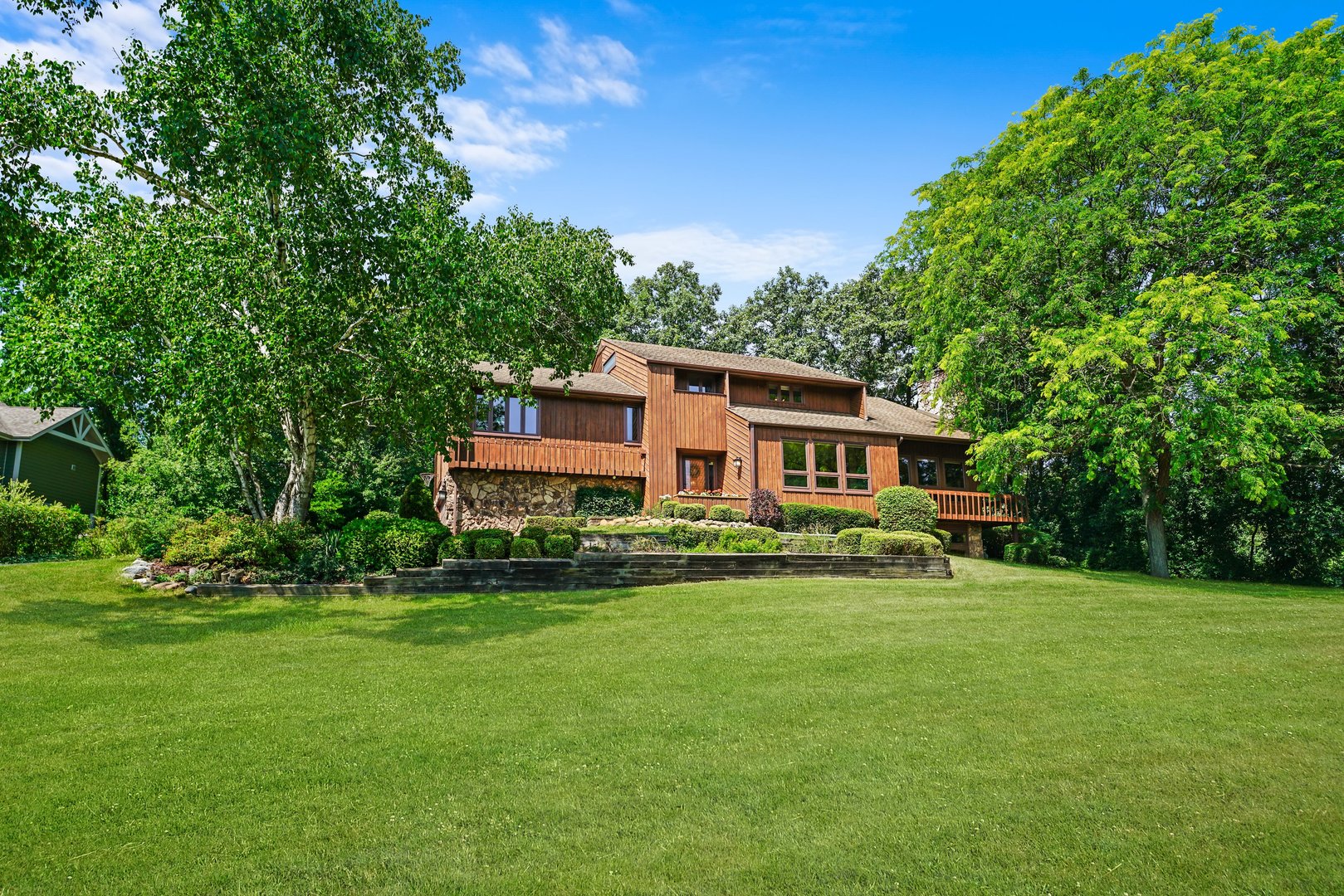 20320 Lea Road Deer Park, IL 60010 - Photo 2 of 31 a front view of a house with a garden