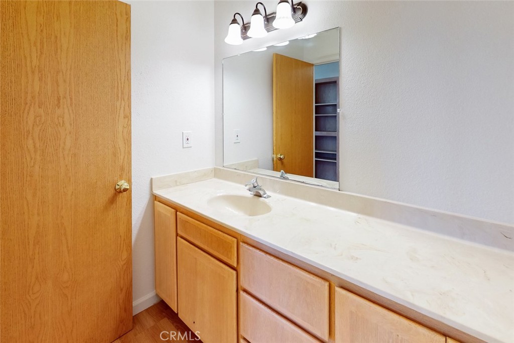 1718 Robinson Mill Road Bangor, CA 95914 - Photo 33 of 74 a bathroom with a sink and a mirror