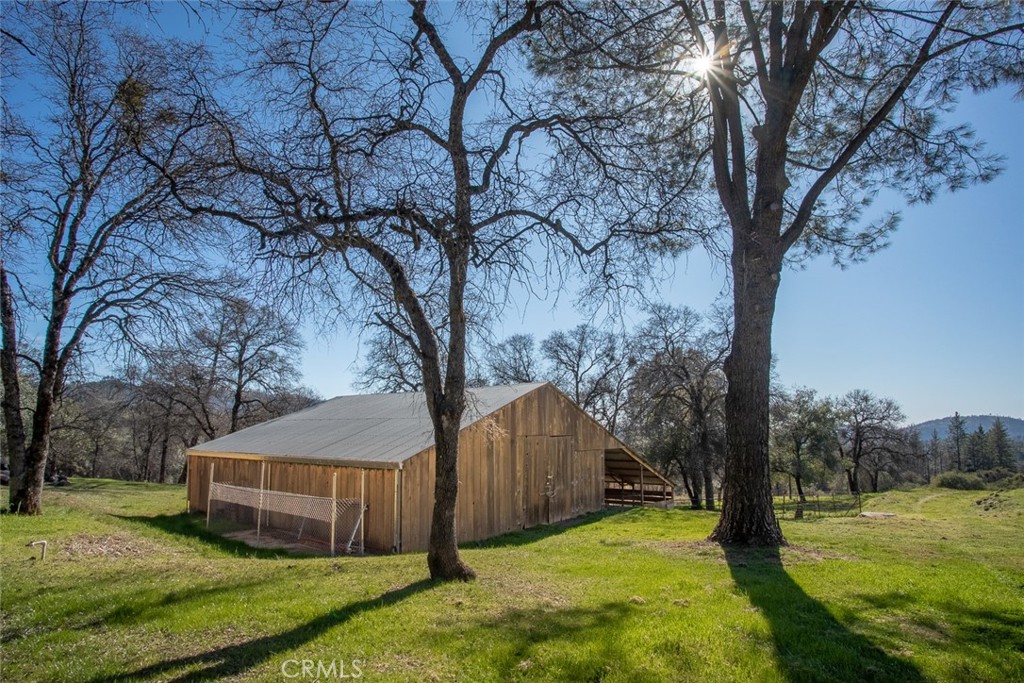 1718 Robinson Mill Road Bangor, CA 95914 - Photo 58 of 74 a view of a house with a yard