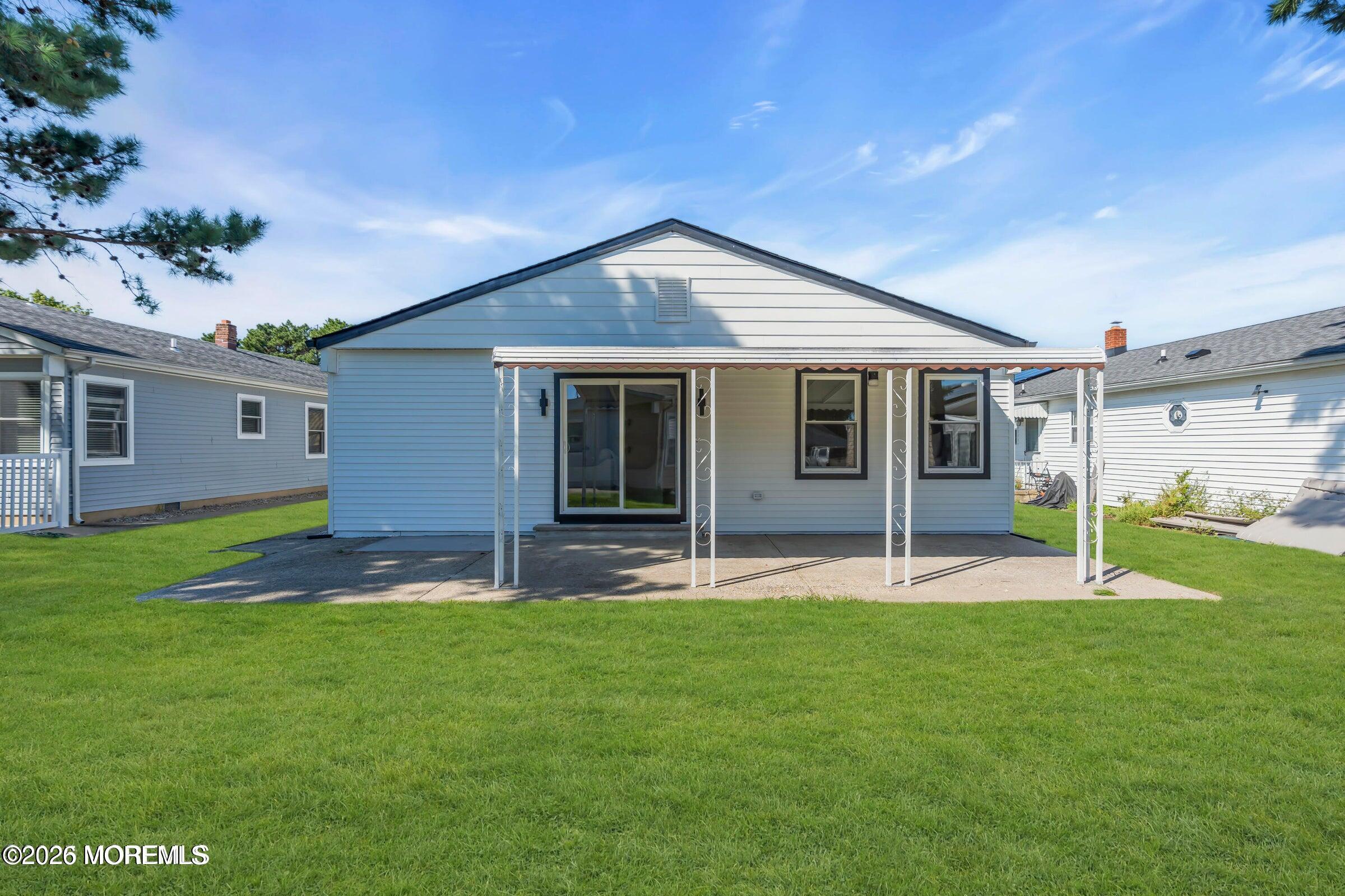 143 Davenport Road Toms River, NJ 08757 - Photo 33 of 41 a house that has a big yard