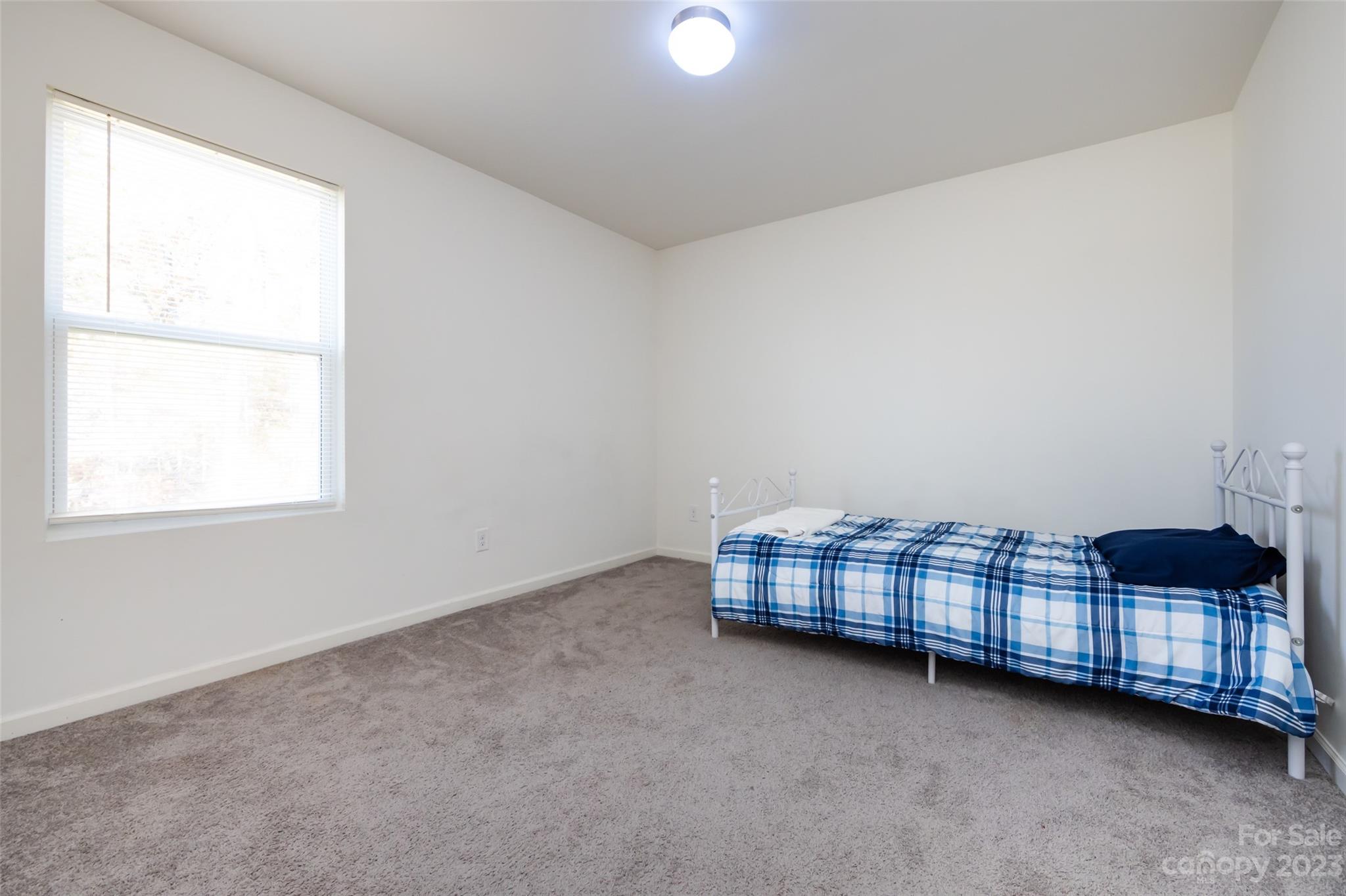 3823 Tersk Drive Midland, NC 28107 - Photo 14 of 24 a room with a cabinet and a window