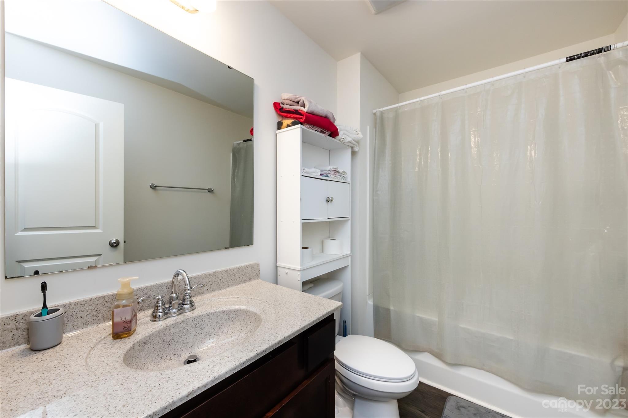 3823 Tersk Drive Midland, NC 28107 - Photo 17 of 24 a bathroom with a sink toilet and shower