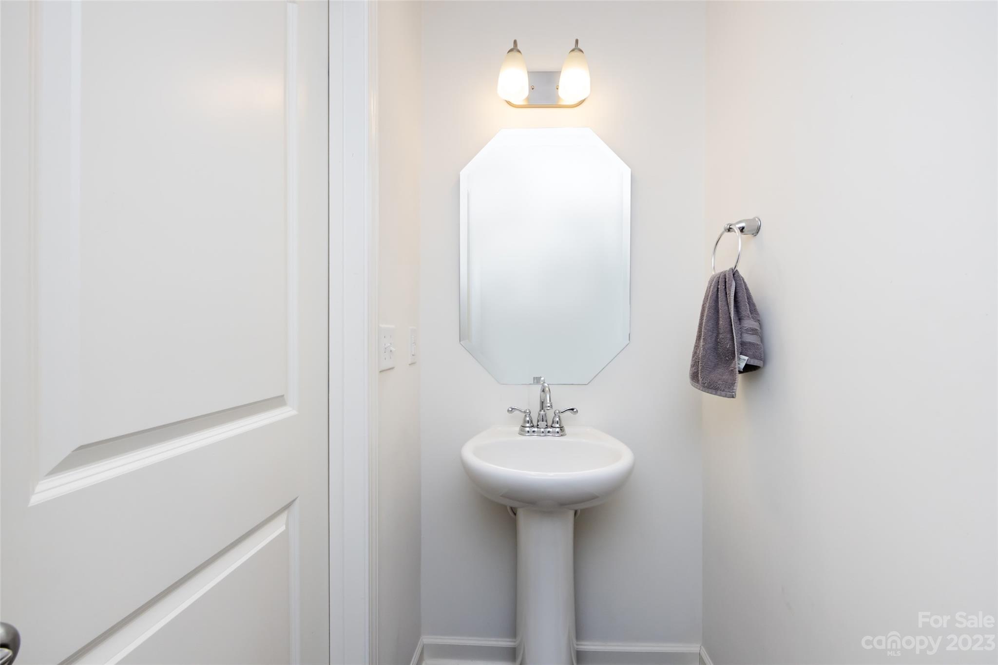 3823 Tersk Drive Midland, NC 28107 - Photo 20 of 24 a bathroom with a sink and mirror