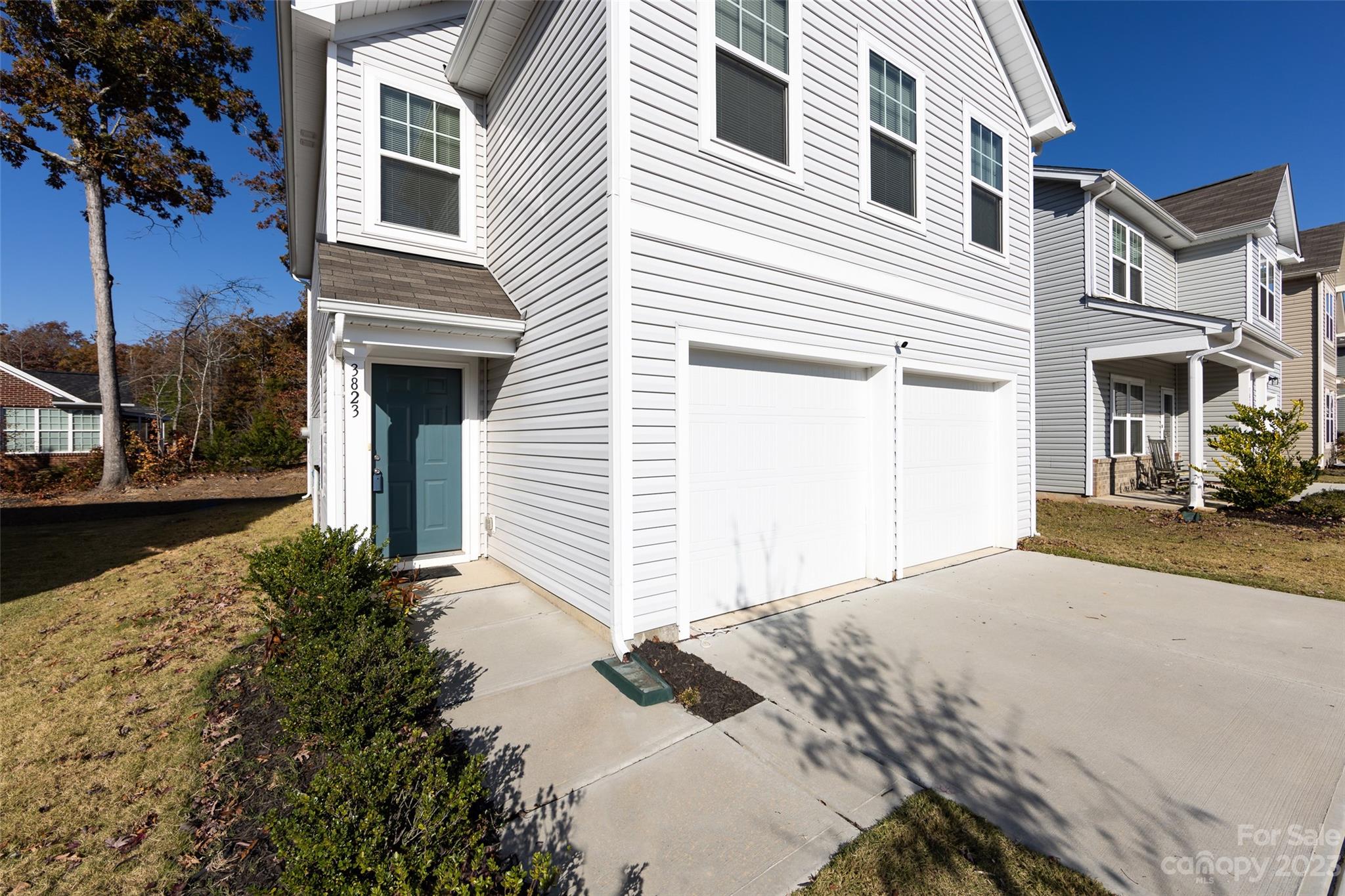 3823 Tersk Drive Midland, NC 28107 - Photo 24 of 24 a front view of a house with a yard and garage