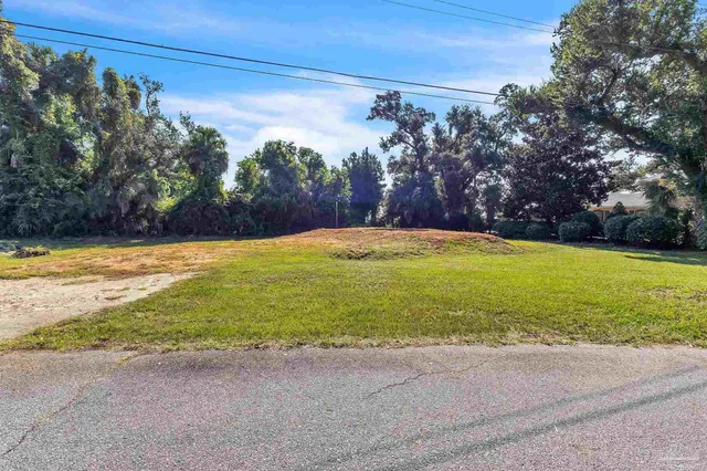 a view of a swimming pool and an outdoor space