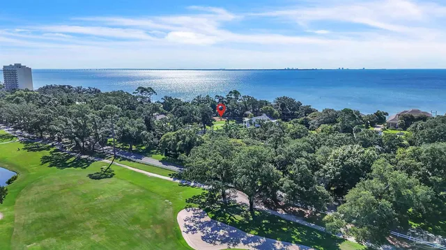 an aerial view of a golf course with street view
