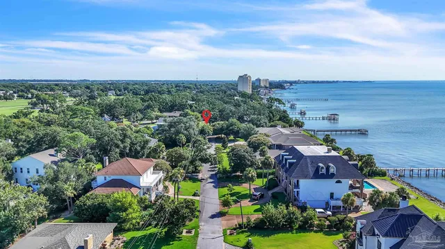 an aerial view of a house with a garden