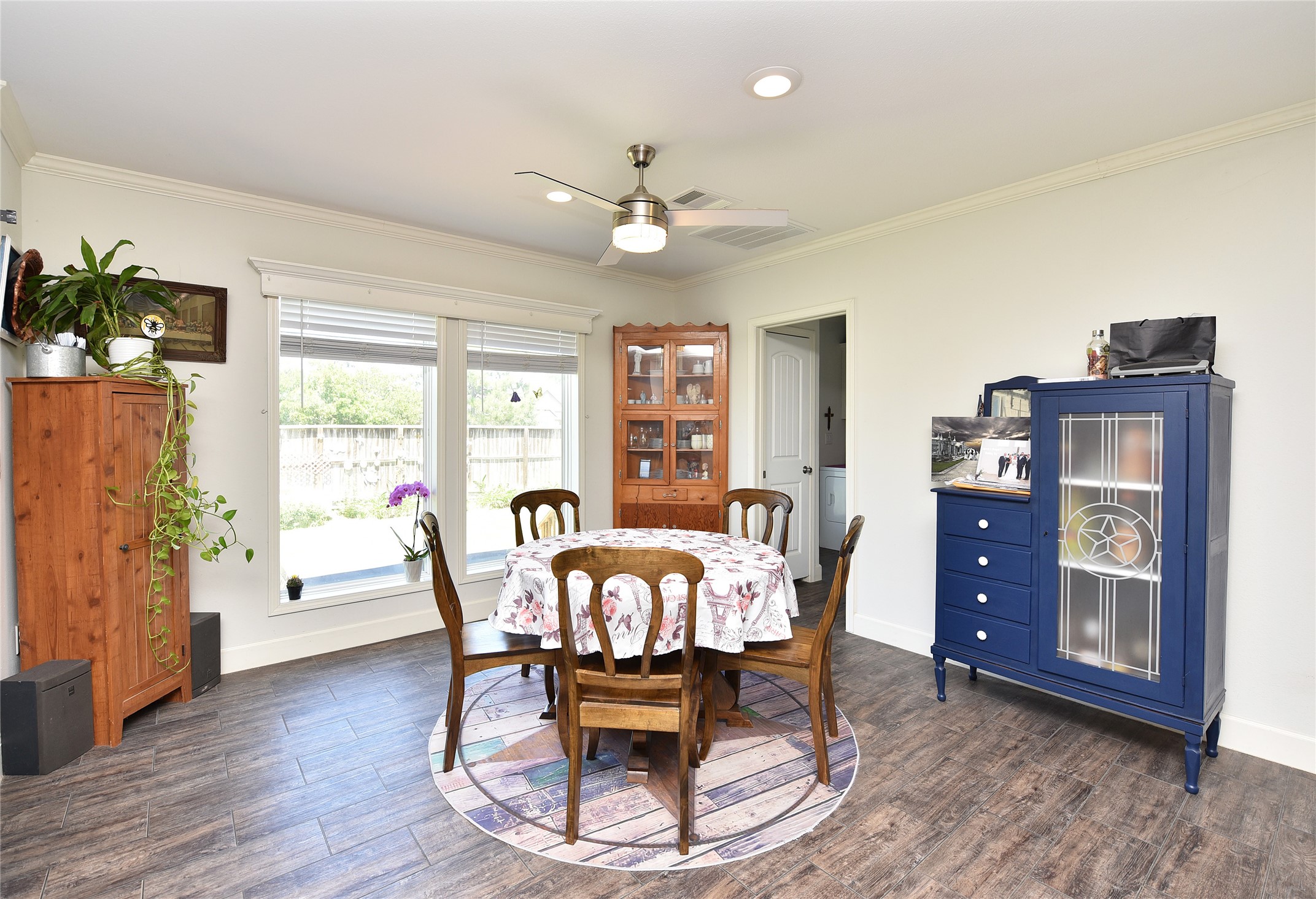 3221 Pecha Lane Rosenberg, TX 77471 - Photo 12 of 46 a view of a dining room with furniture window and wooden floor