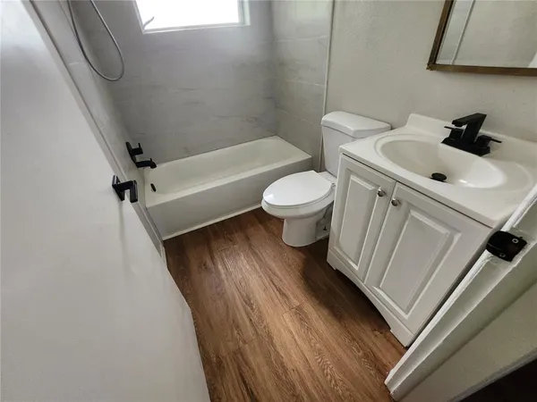 a bathroom with a sink and a toilet