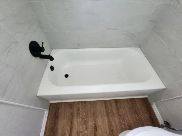 a bathroom with a bathtub