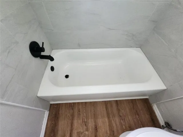 a bathroom with a bathtub