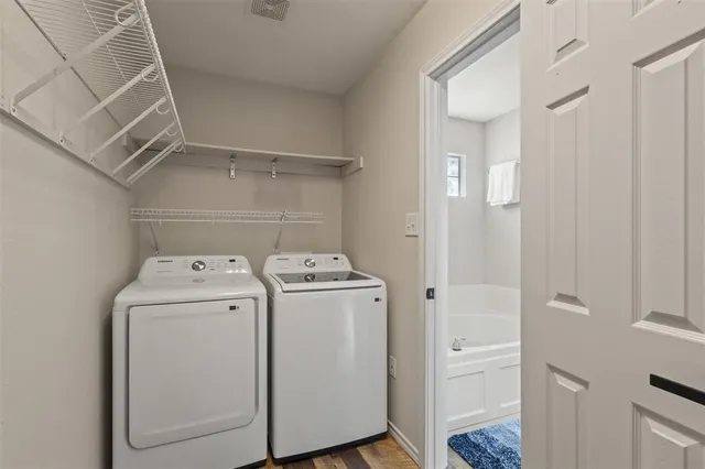 a utility room with dryer and washer