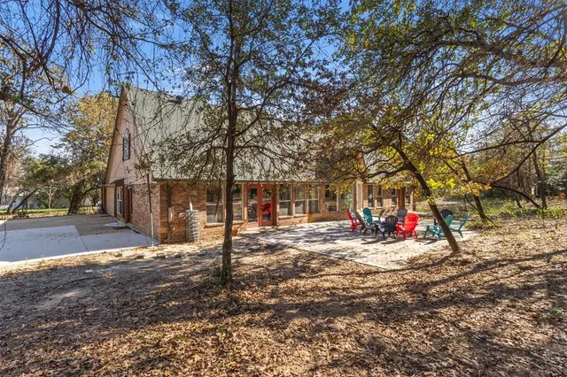 a view of a park with of swings and slides