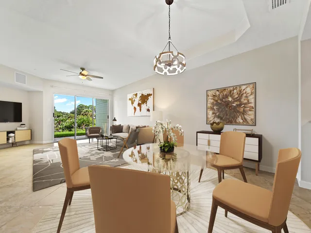 a view of a dining room with furniture window and outside view