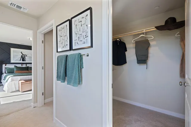 a view of a patio with couches table and chairs and potted plants