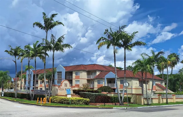 a front view of a multi story residential apartment buildings
