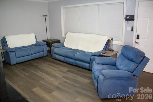 a living room with furniture and a couch