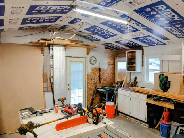 a view of gym equipment with racks on the wall