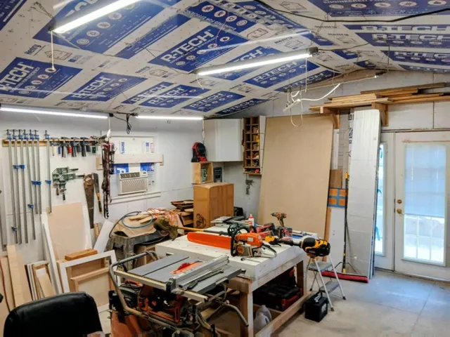 a view of a workspace with furniture