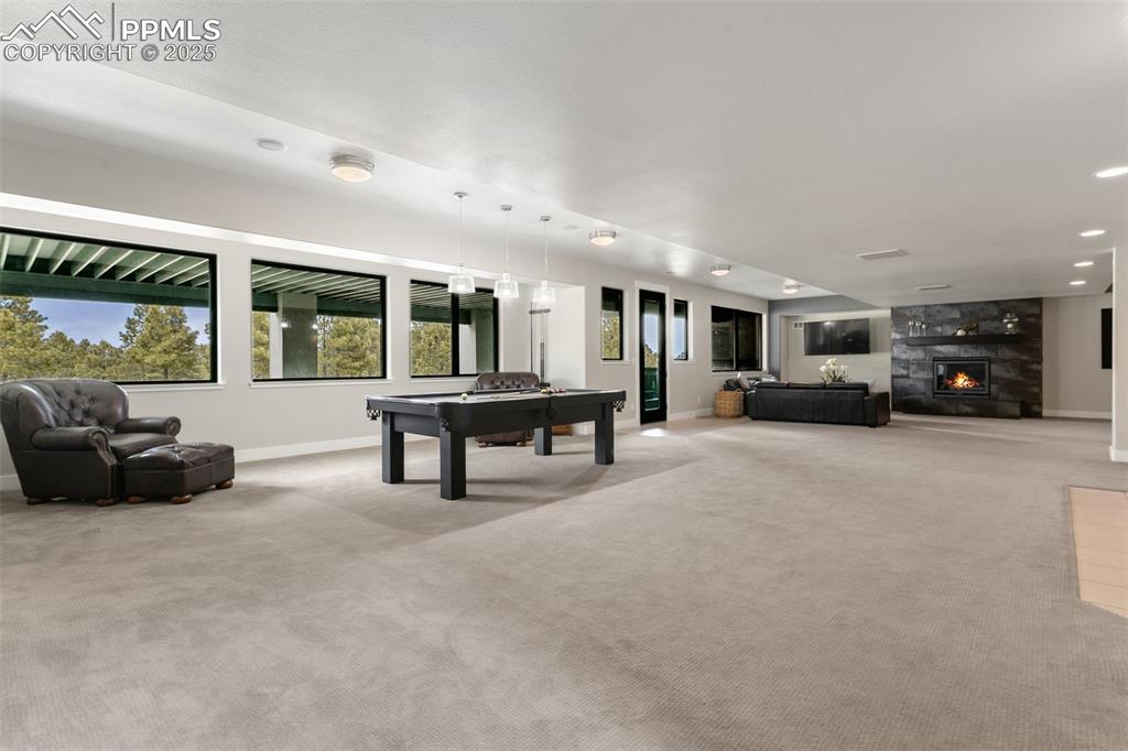 843 Long Timber Monument, CO 80132 - Photo 29 of 50 a living room with furniture and a large window
