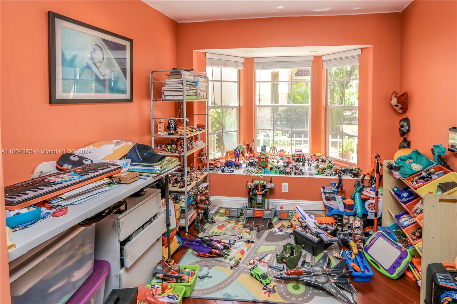 15253 Southwest 111th Street Miami, FL 33196 - Photo 17 of 32 a room with musical instruments