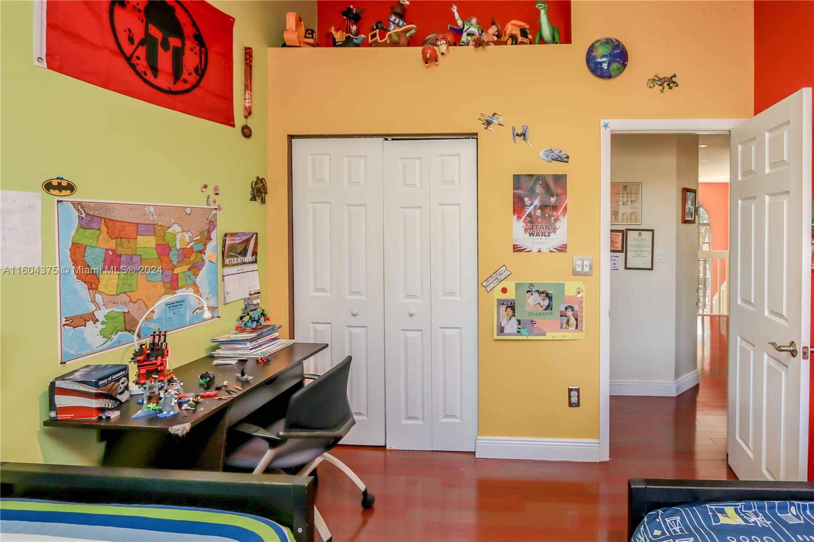 15253 Southwest 111th Street Miami, FL 33196 - Photo 20 of 32 a room with toys and wall paintings