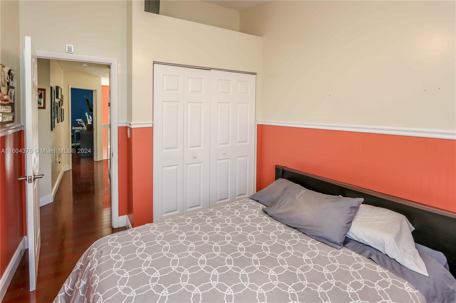 15253 Southwest 111th Street Miami, FL 33196 - Photo 22 of 32 a bedroom with a bed and closet