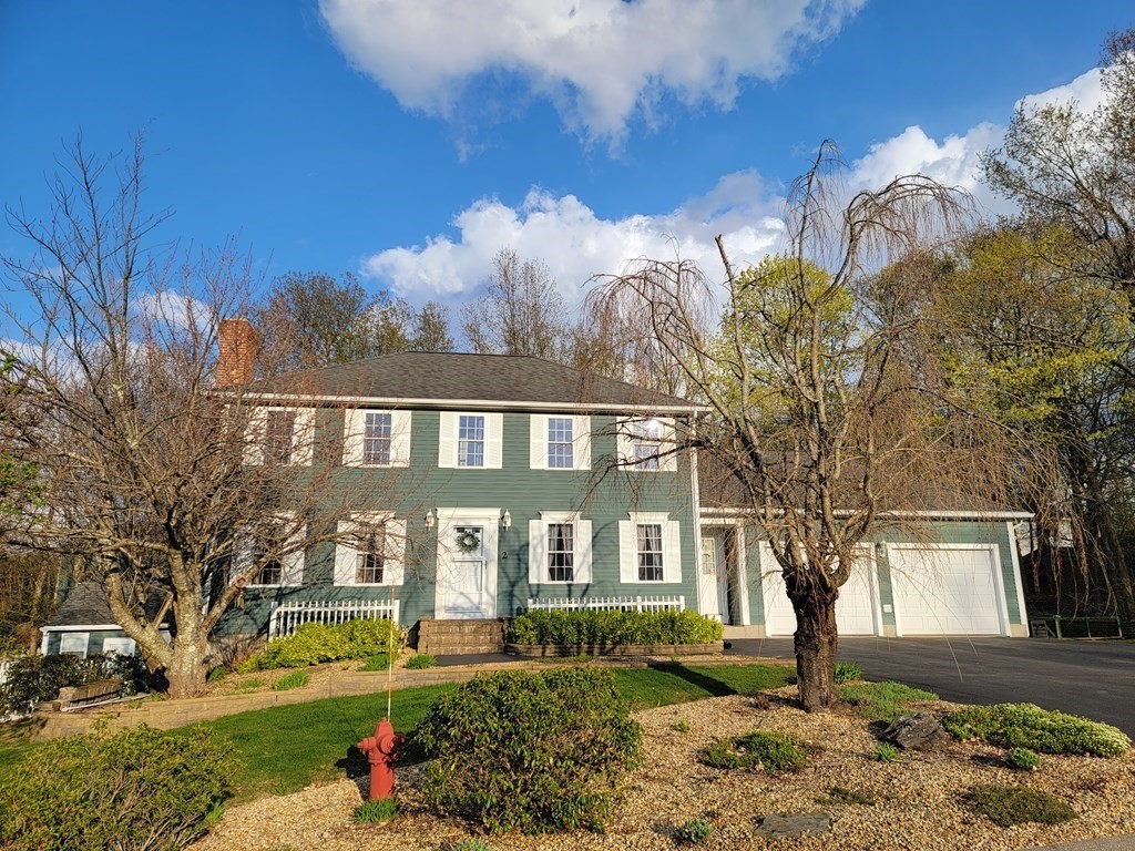 2 Ivy Lane Rutland, MA 01543 - Photo 1 of 34 a front view of a house with a yard