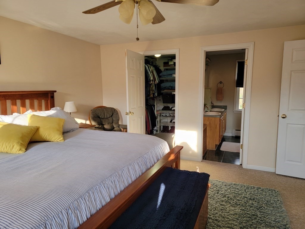 2 Ivy Lane Rutland, MA 01543 - Photo 17 of 34 a bedroom with bed and walk in closet
