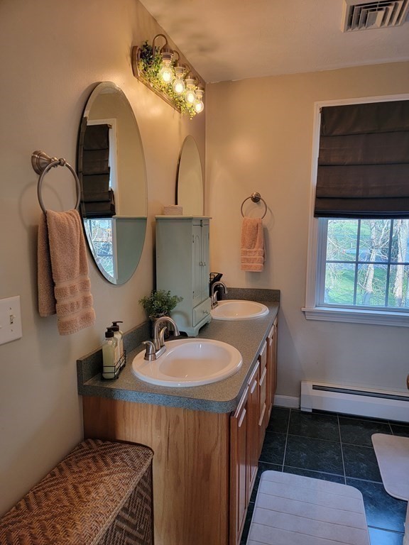 2 Ivy Lane Rutland, MA 01543 - Photo 18 of 34 a bathroom with a sink and a mirror