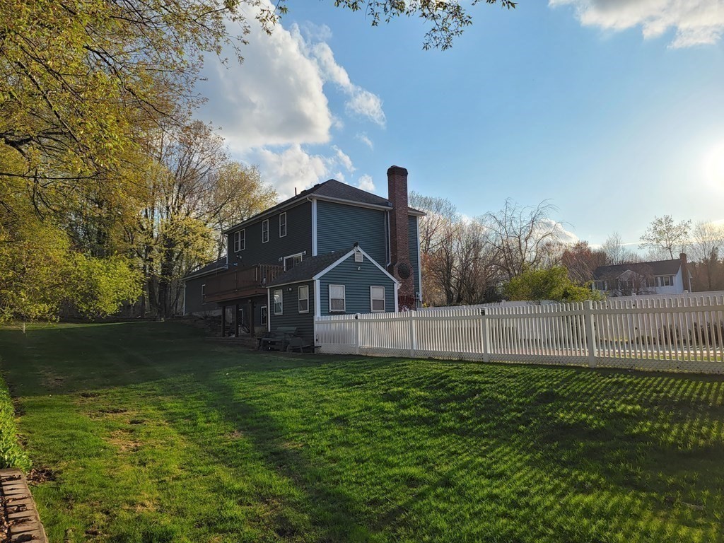 2 Ivy Lane Rutland, MA 01543 - Photo 25 of 34 a view of a house with a big yard and a large tree