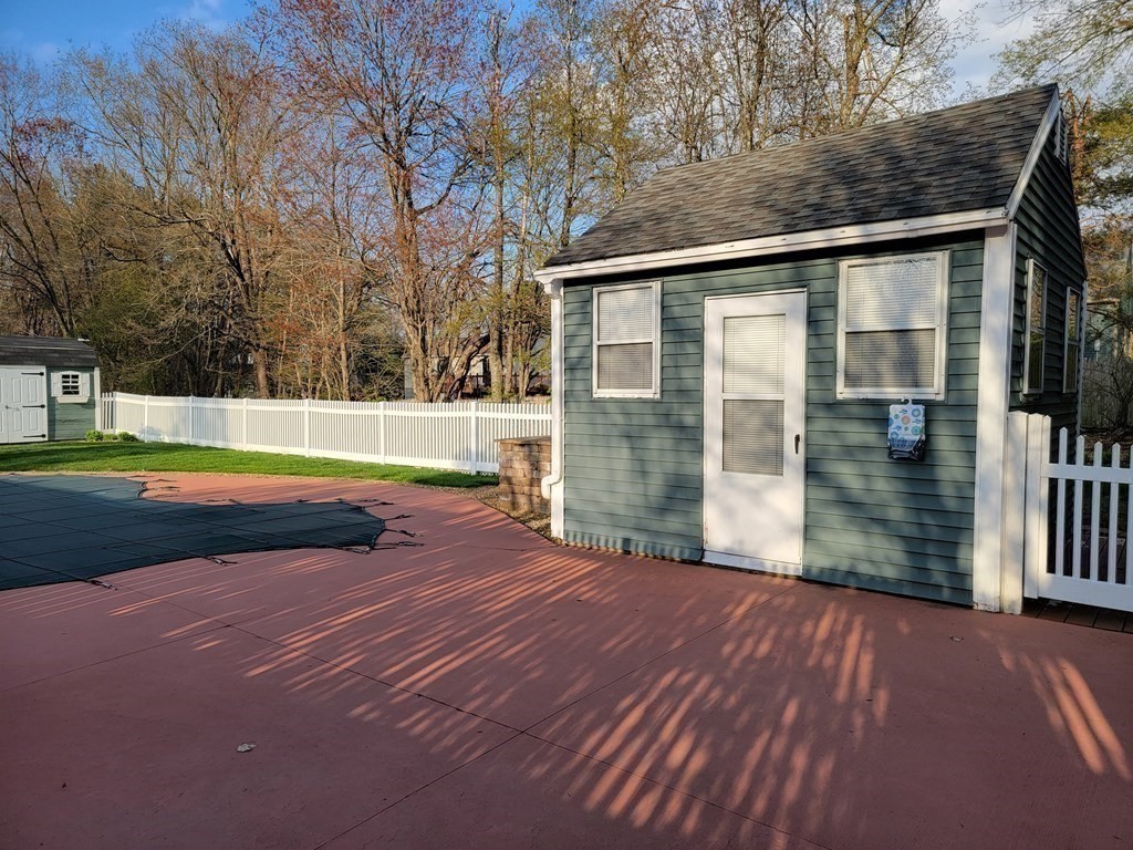 2 Ivy Lane Rutland, MA 01543 - Photo 27 of 34 a view of backyard with swimming pool and outdoor seating