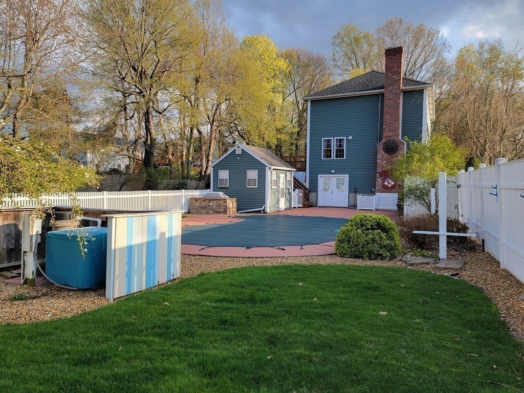 2 Ivy Lane Rutland, MA 01543 - Photo 30 of 34 a view of a house with backyard and a garden