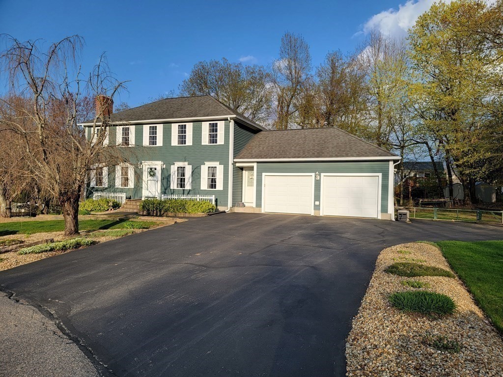 2 Ivy Lane Rutland, MA 01543 - Photo 32 of 34 a view of a house with a yard