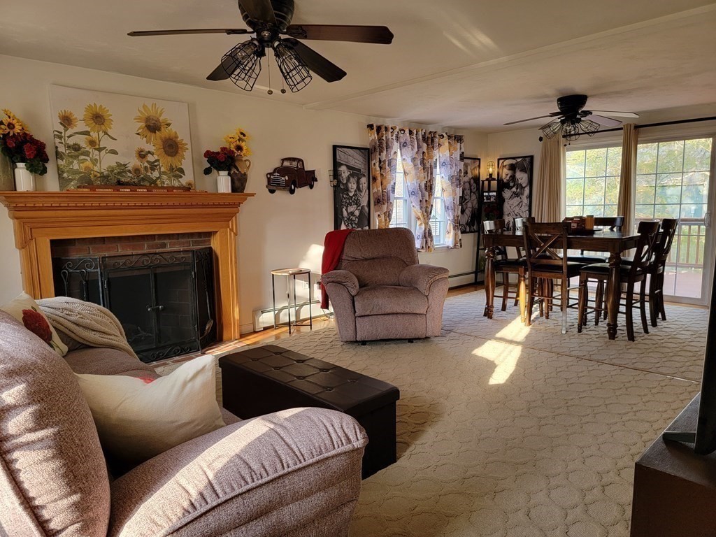 2 Ivy Lane Rutland, MA 01543 - Photo 6 of 34 a living room with furniture and a fireplace