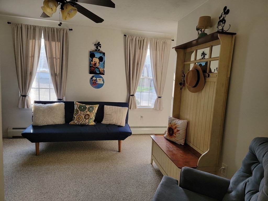 2 Ivy Lane Rutland, MA 01543 - Photo 9 of 34 a view of hallway with furniture and a window