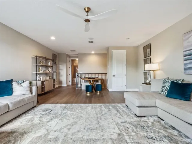 a living room with furniture and a couch
