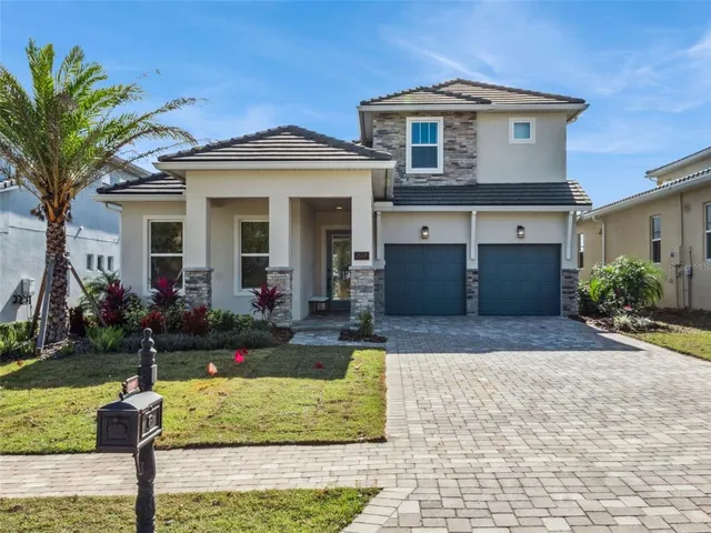 an aerial view of lake residential houses with outdoor space and swimming pool