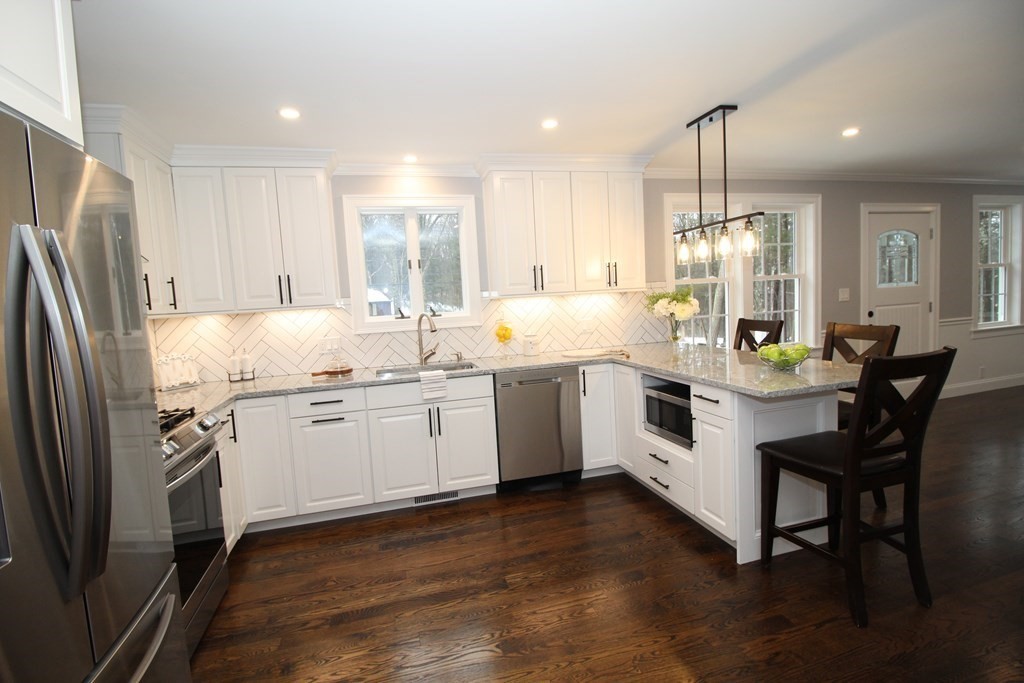 79 Dudley Road Templeton, MA 01468 - Photo 11 of 40 a kitchen with a sink appliances and cabinets